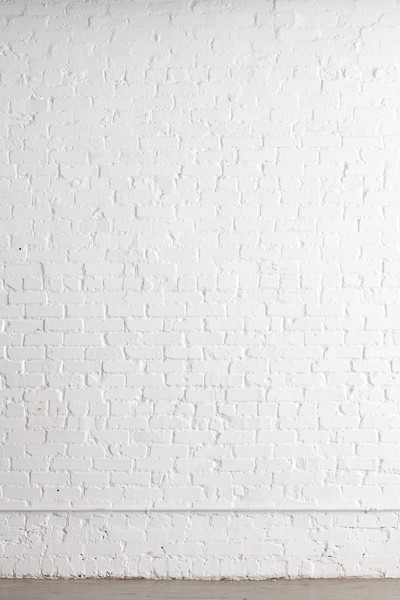 White Brick Wall at Vora Dallas